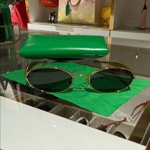 Bottega Veneta Sunglasses with Green Lenses and Gold Frame